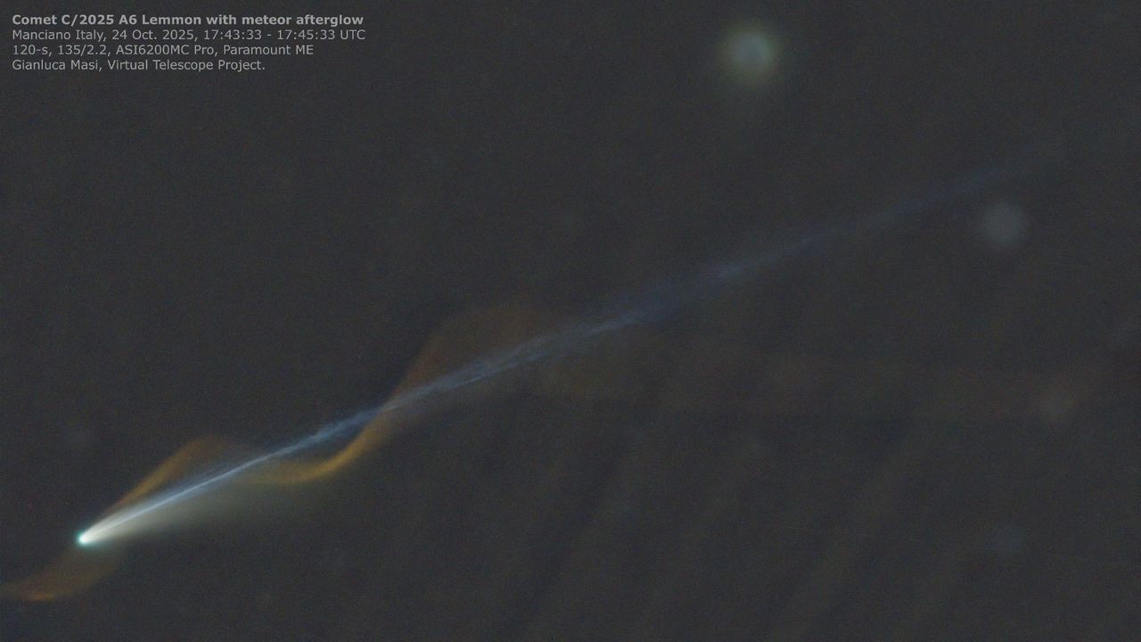 Glowing meteor trail photobombs Comet Lemmon in incredible telescope footage. 'A pure perspective miracle'