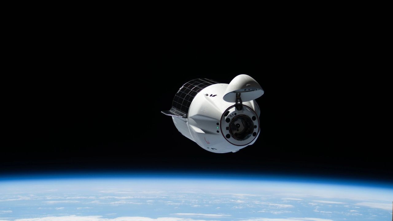 SpaceX Dragon cargo capsule boosts ISS higher above Earth in key test