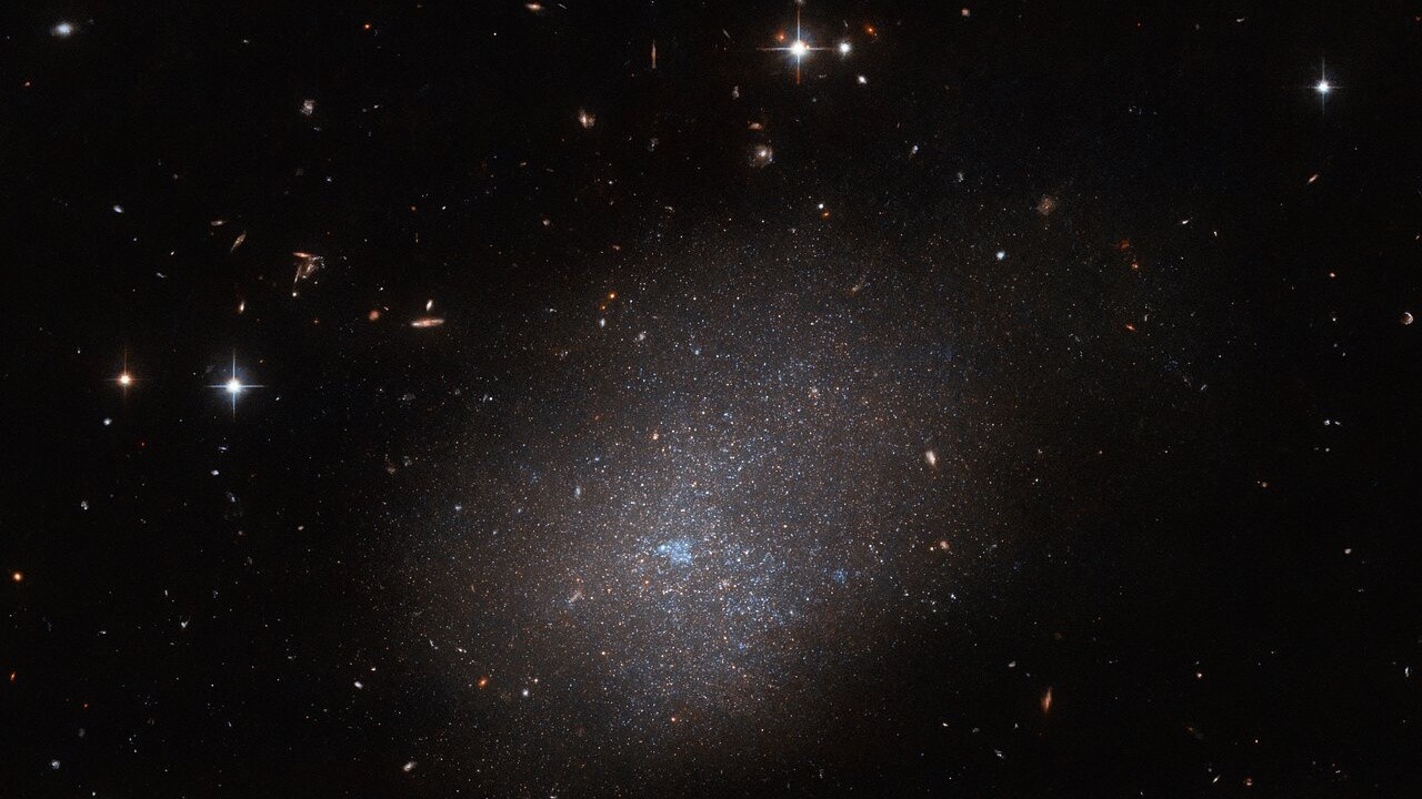 Hubble Space Telescope captures the soft glow of a distant galaxy (photo)
