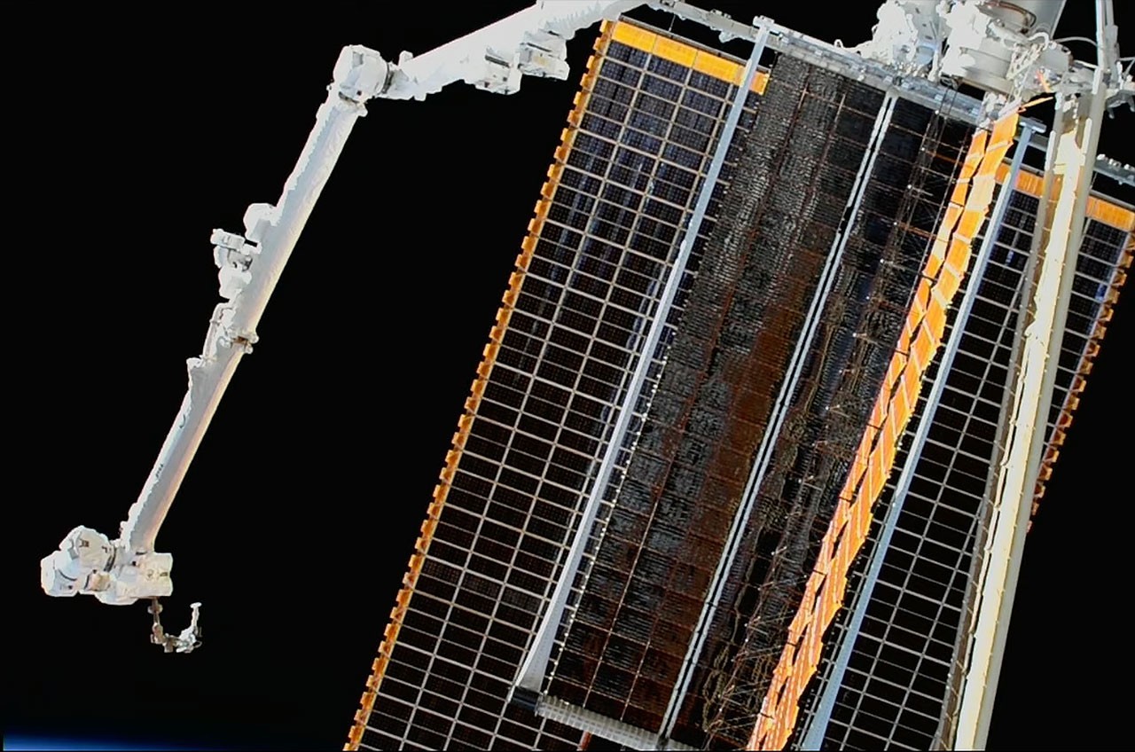 Astronauts unfurl final roll-out solar array (for now) at space station in record-tying spacewalk