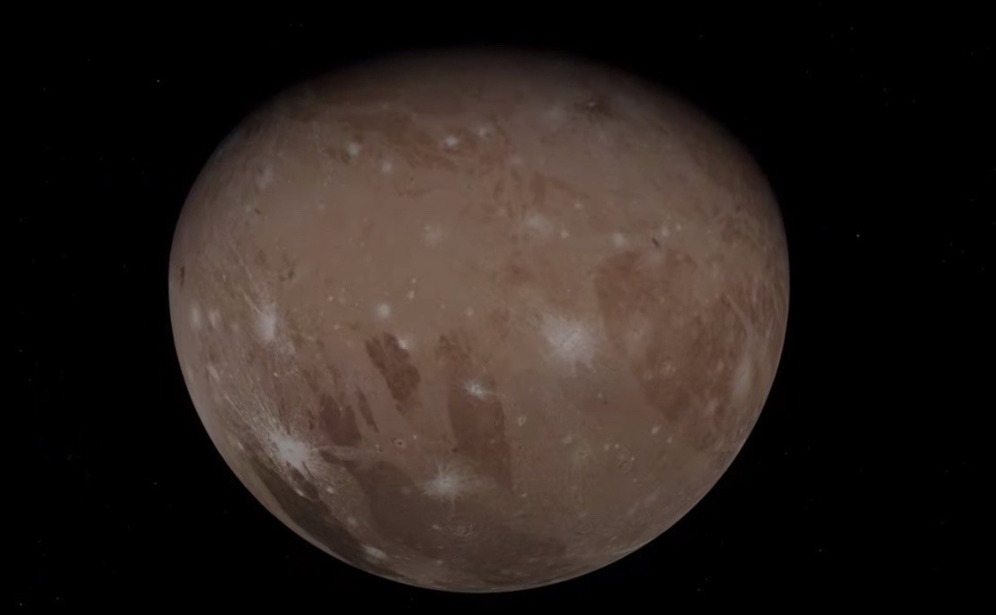 Cruise by Jupiter and its giant moon Ganymede in this gorgeous Juno flyby video