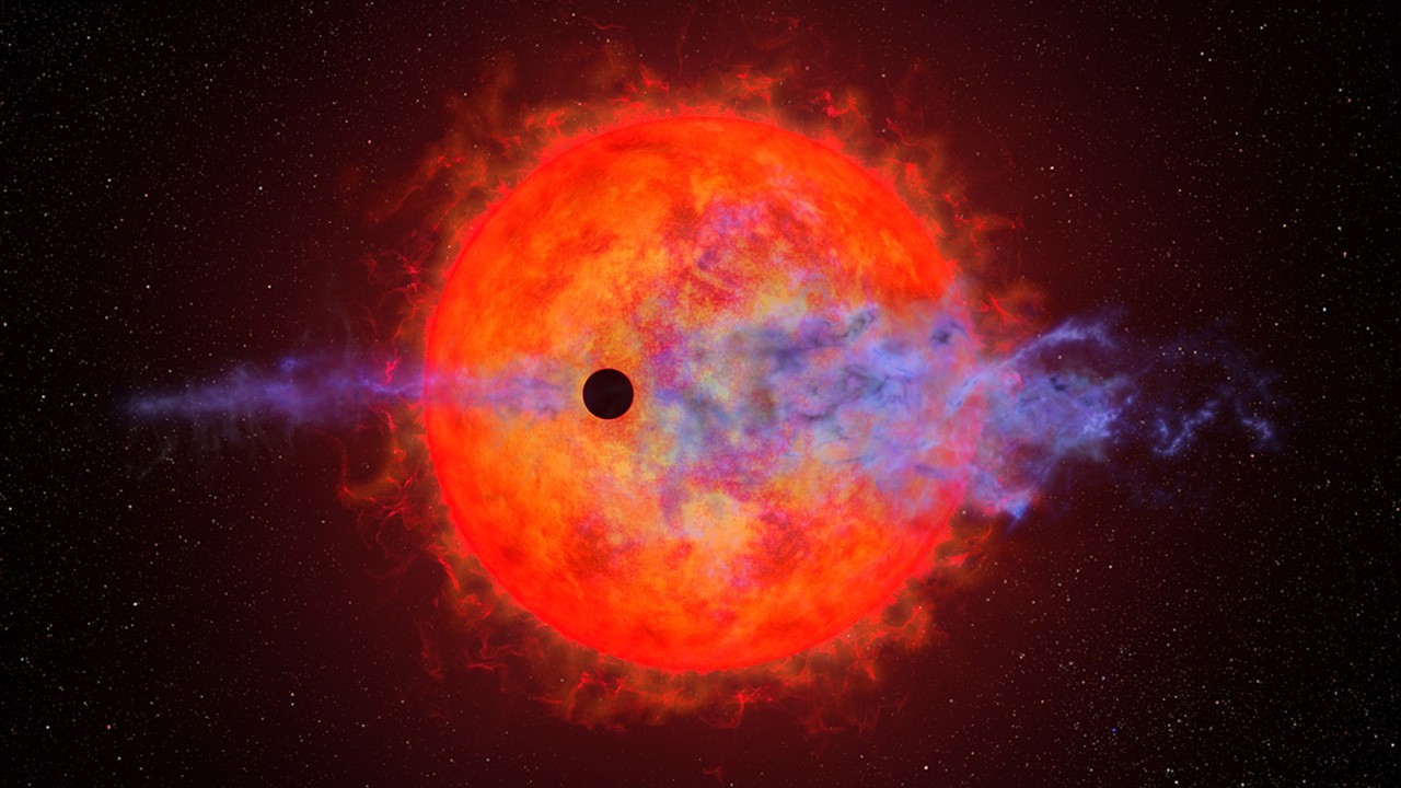 Hubble telescope sees an angry star and an evaporating planet