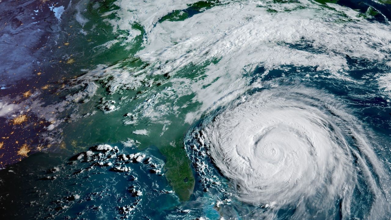 Watch Hurricane Erin swirl menacingly in the Atlantic Ocean in NOAA satellite video