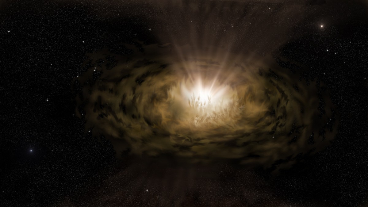 Black holes at galactic centers blast out 10 times more light than previously thought