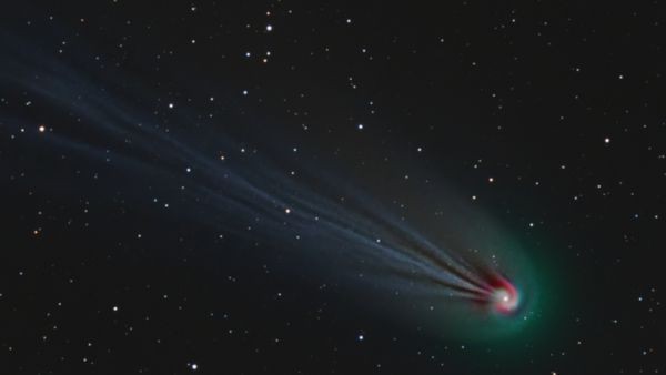 Explosive, green 'devil comet' has hidden spiral swirling around its icy heart, photo trickery reveals