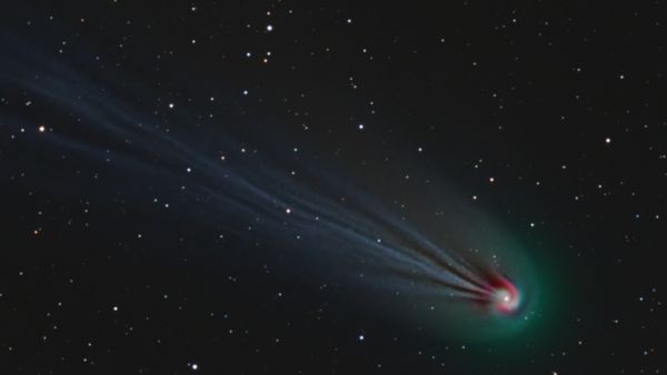 Explosive, green 'devil comet' has hidden spiral swirling around its icy heart, photo trickery reveals